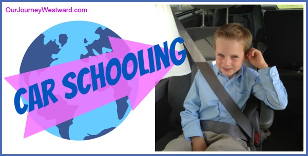 Boy in blue shirt sits in a car seat. For a blog post about car schooling.