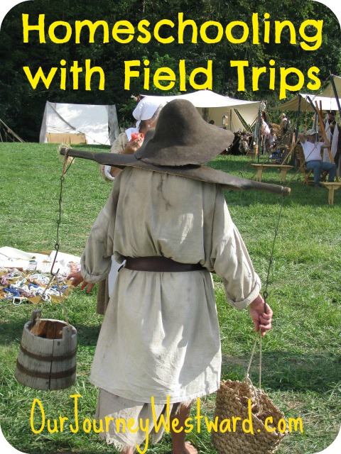 Homeschooling field trips blog post with a photo of a person dressed in a pioneer outfit carrying water buckets with the yoke across their shoulders.