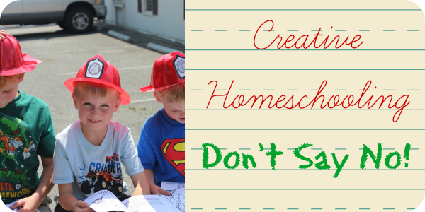 Boys in red firemen hats. Image is used for a blog post about Creative Homeschooling