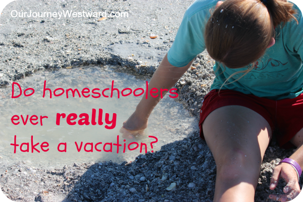 Girl sits in the sand and pts her had in a little pool that is made from sand and filled with ocean water. Used as the blog image for a post about homeshoolers taking vacations.