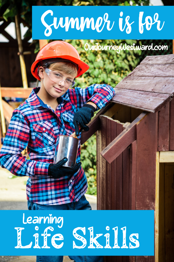 Boy in flannel and hardhat painting a dog house. Promoting a blog post about life skills.