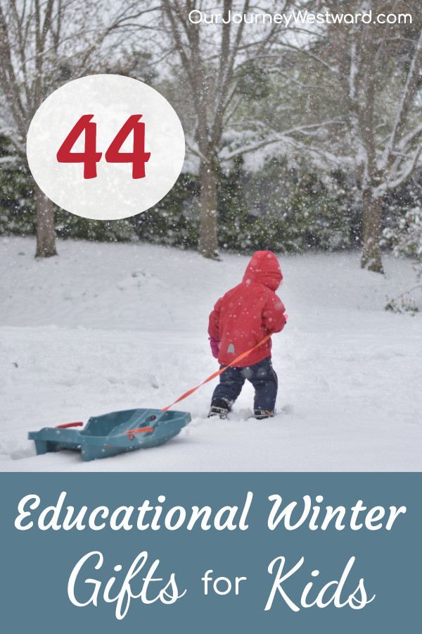 child with sled in the snow advertising a blog post about winter gifts